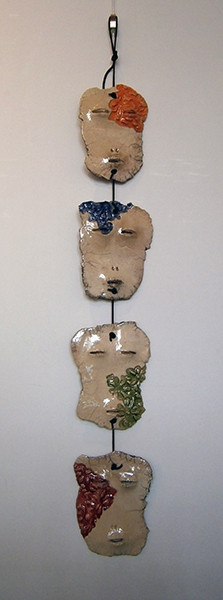 Colja de Roo + Set maskers aan koord, raku kleuren